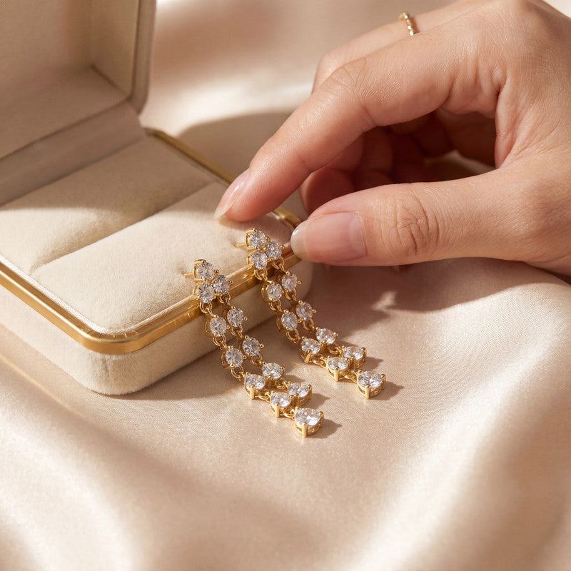 Leveret earrings in an open jewelry box